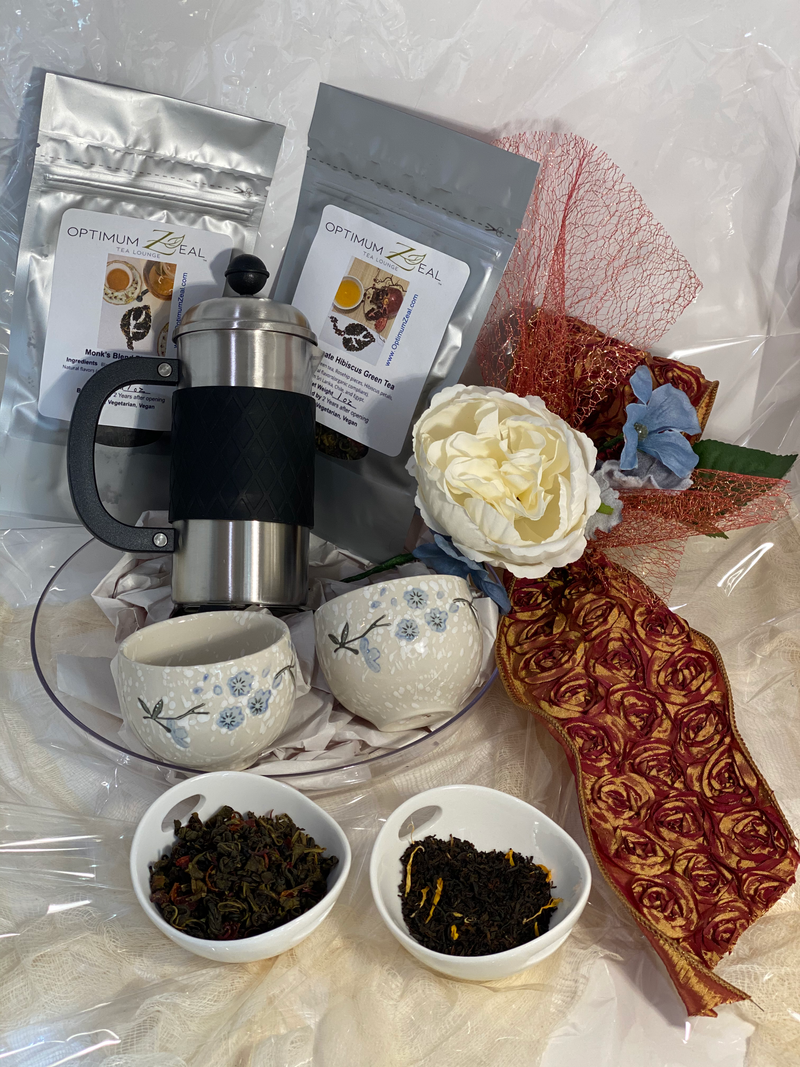 Tea press, tea, and cups Gift Basket