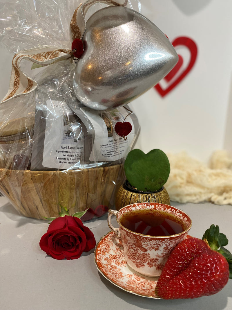 Valentine's Day Gift Basket with loose leaf tea, mug with lid,  tea infuser in a boat-shaped natural basket from OptimumZeal