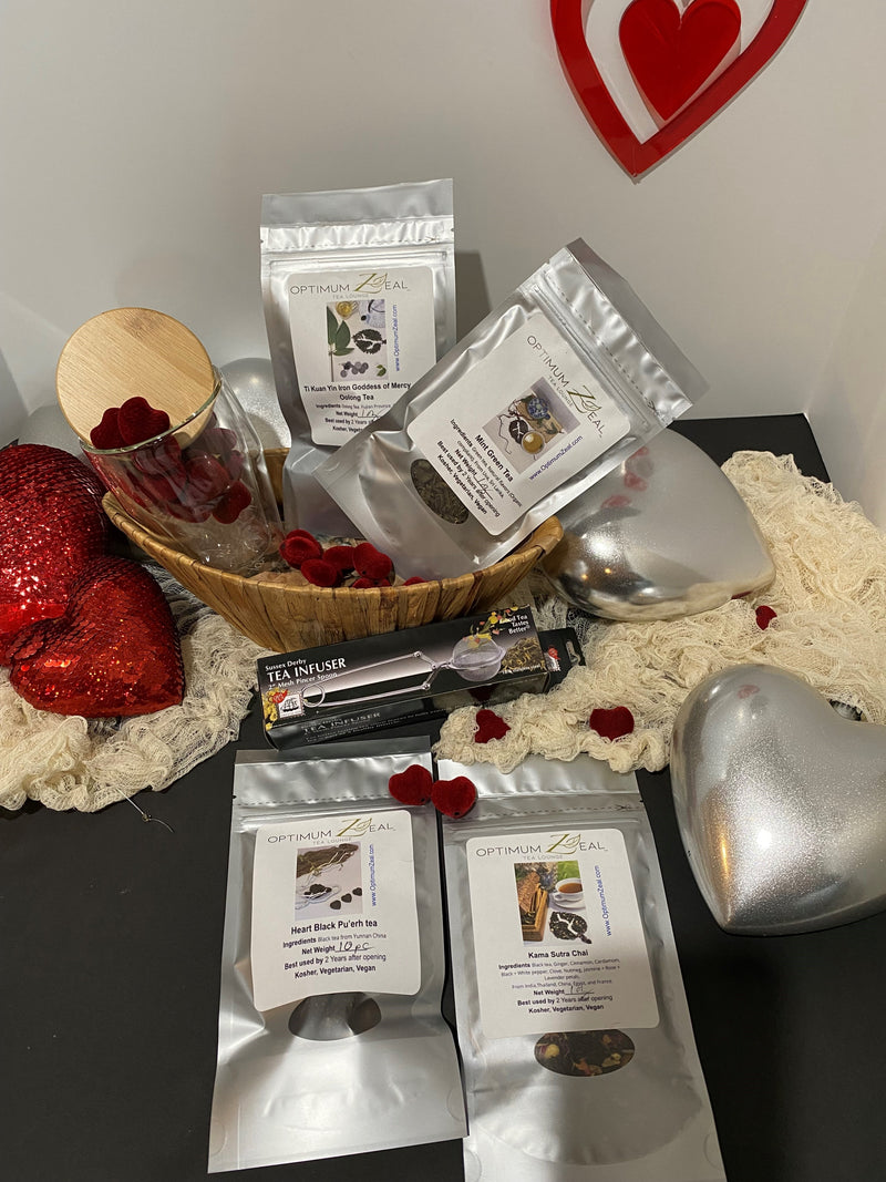 Valentine's Day Gift Basket with loose leaf tea, mug with lid,  tea infuser in a boat-shaped natural basket from OptimumZeal