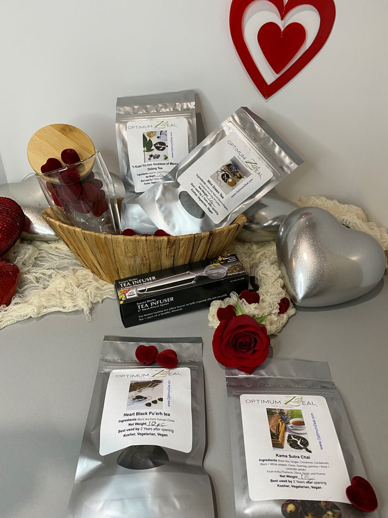 Valentine's Day Gift Basket with loose leaf tea, mug with lid,  tea infuser in a boat-shaped natural basket from OptimumZeal